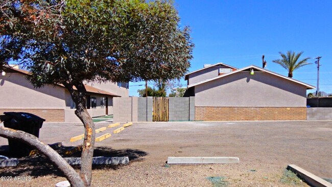 Building Photo - 6440 E Alder Ave