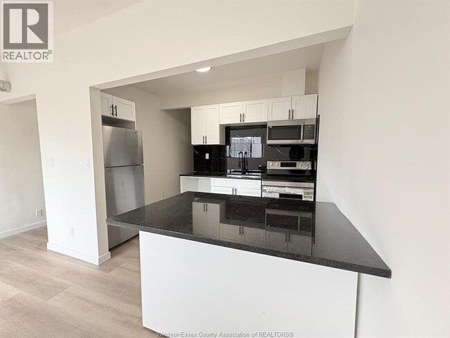 Photo du bâtiment - 1370 Wyandotte St E