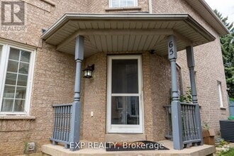 Building Photo - 65 Quail Feather Crescent
