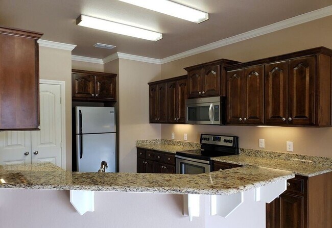 Building Photo - 4013 Stonebridge Dr