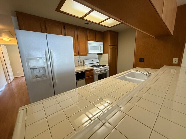Building Photo - $500 OFF FIRST MONTH'S RENT! Los Caballeros: Upper 2 Bedroom 2 Bath,