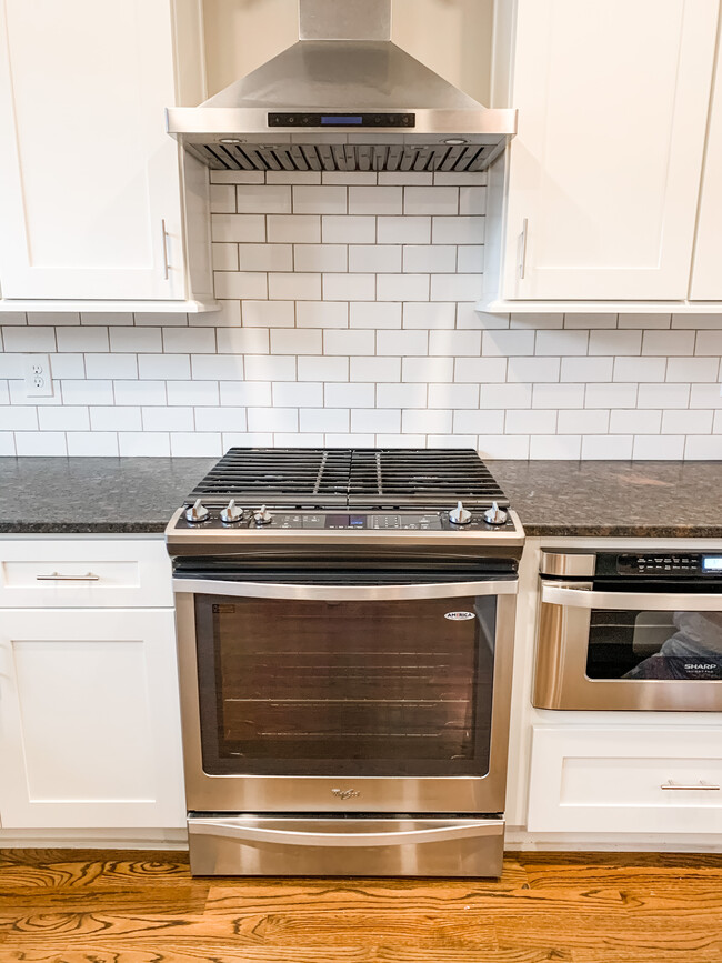 Stainless steel gas range and microwave - 1601 Rebecca Ave