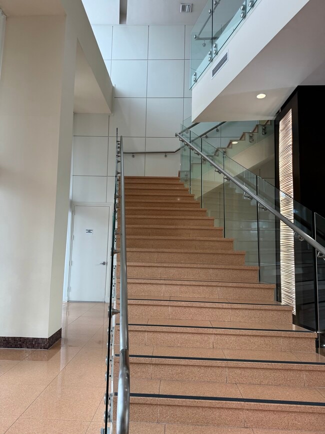 Lobby stairs case - 2775 NE 187th St