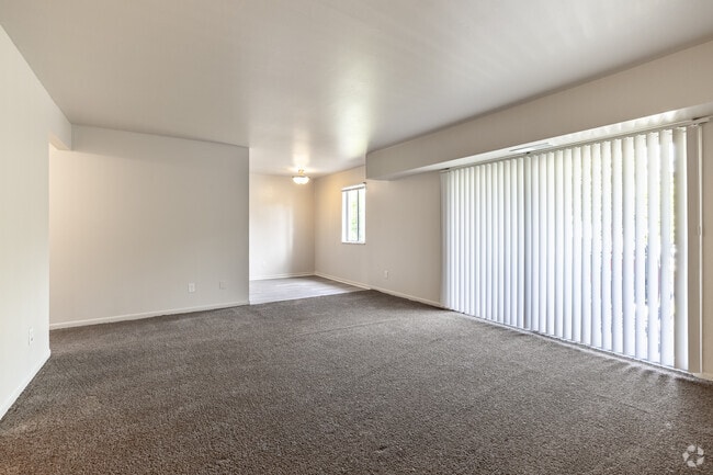 2BR, 1BA - 900SF - Living Room - Camelot Apartments
