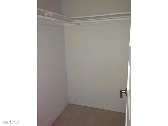 Building Photo - 10220 Collins Ave