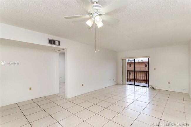 Living room facing balcony - 1800 W 54th St