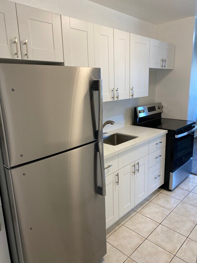 Renovated kitchen with stainless steel appliances - 45 Gardiner Rd