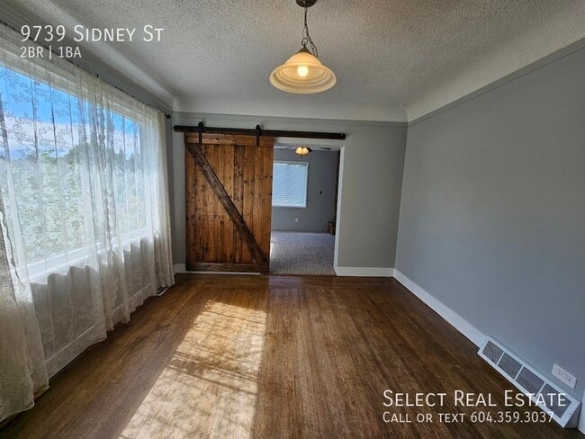 Building Photo - 9739 Sidney St