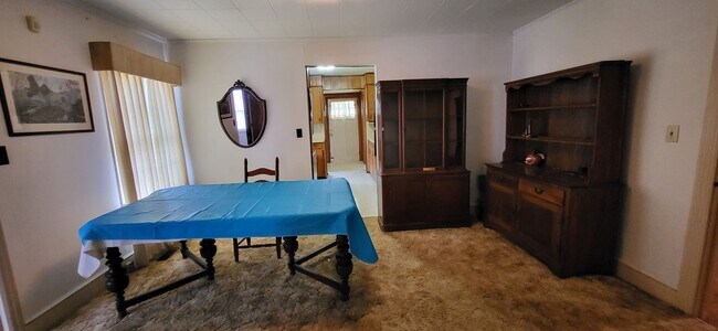Foto del edificio - 2-bedroom, 1-bath partially furnished home