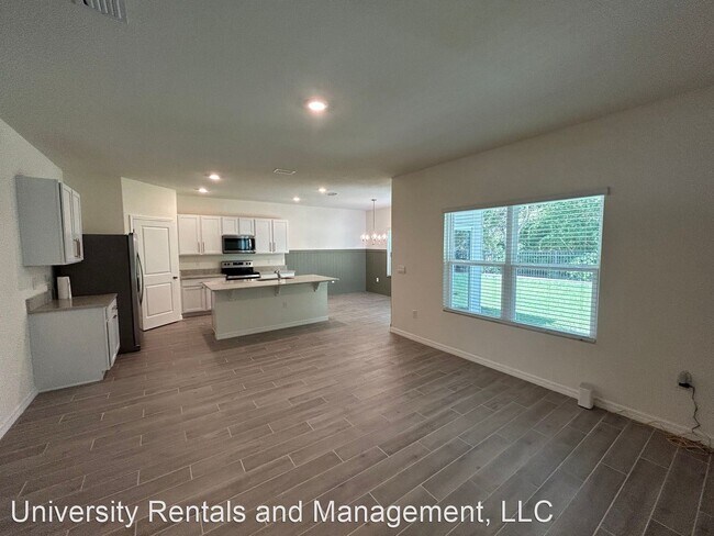 Building Photo - 3 br, 2.5 bath House - 4695 SW 51st Dr