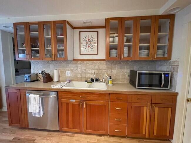 Building Photo - "House on The Hill, Updated and Renovated, Private Fenced Yard – 9th and University!"