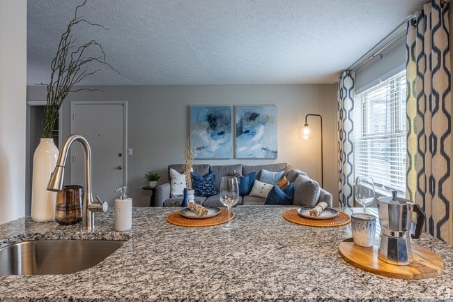 Kitchen with granite counters & deep stainless sink - Union at JTown