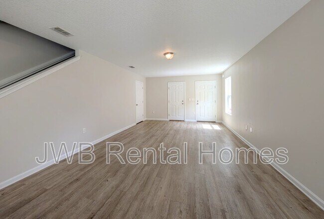 Building Photo - 7804 Playschool Ln