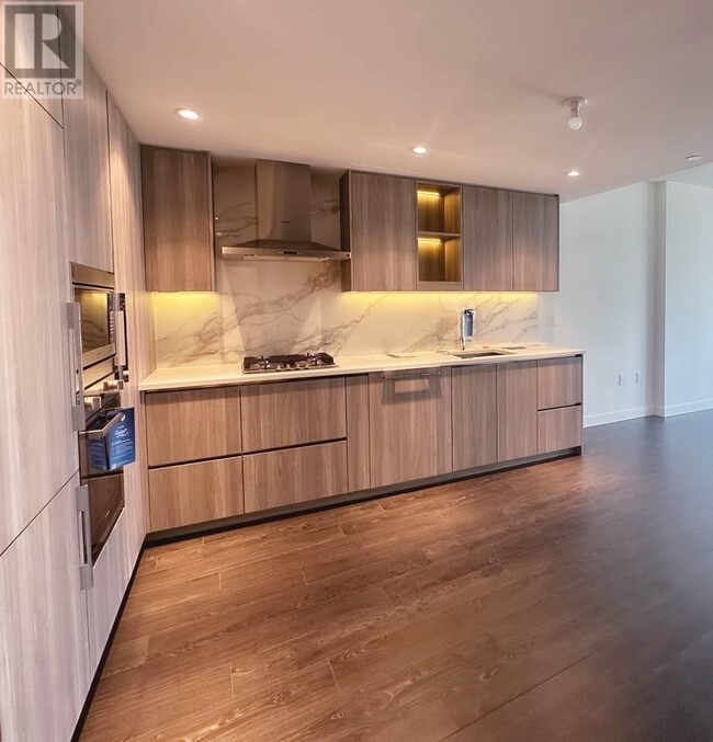 Photo du bâtiment - 8611-8611 Hazelbridge Wy