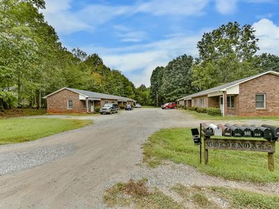 Parking area and view of complex - 343 Sunny Hill Dr