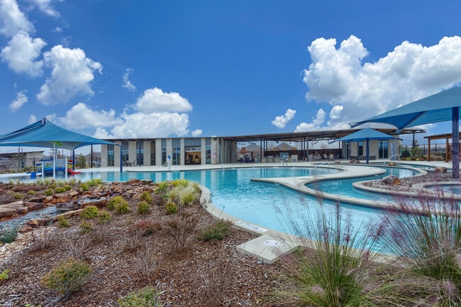 Community pool, fitness center, manmade beach, pond. - 5643 Bristle Leaf Dr