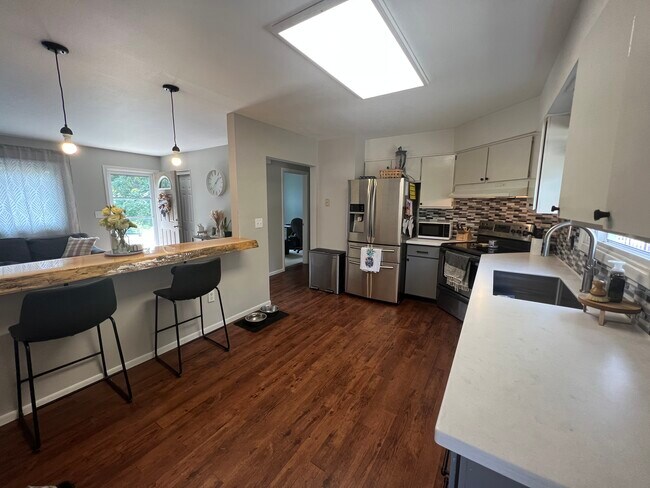 Building Photo - 10996 Brigham Ave
