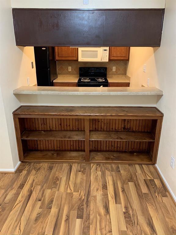 Foto del edificio - 7115 N Holiday Dr