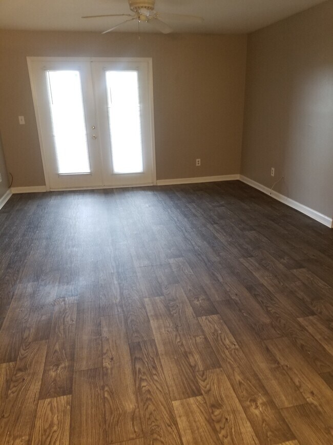Sala de estar del apartamento de la Fase 2 - Magnolia Apartments