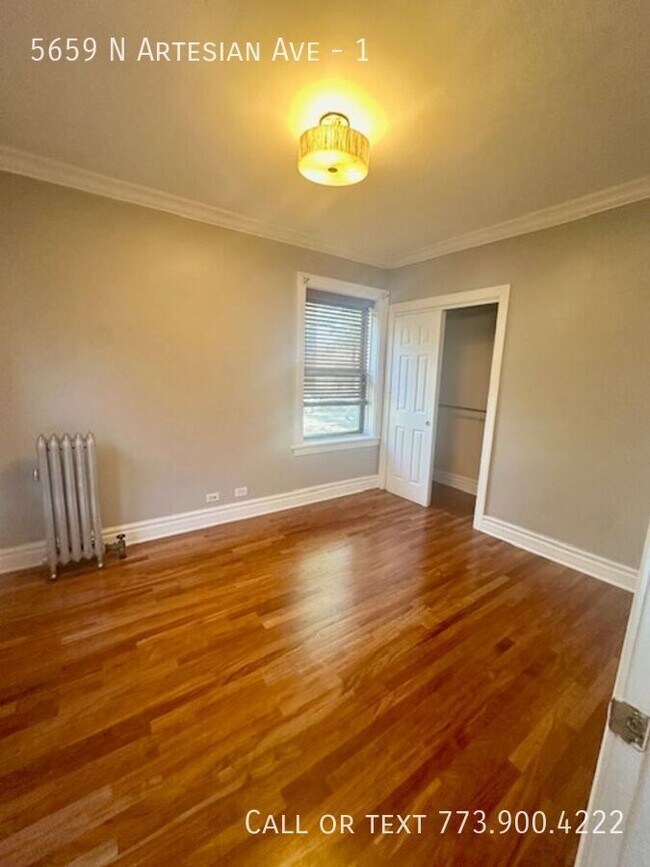 Building Photo - 5659 N Artesian Ave