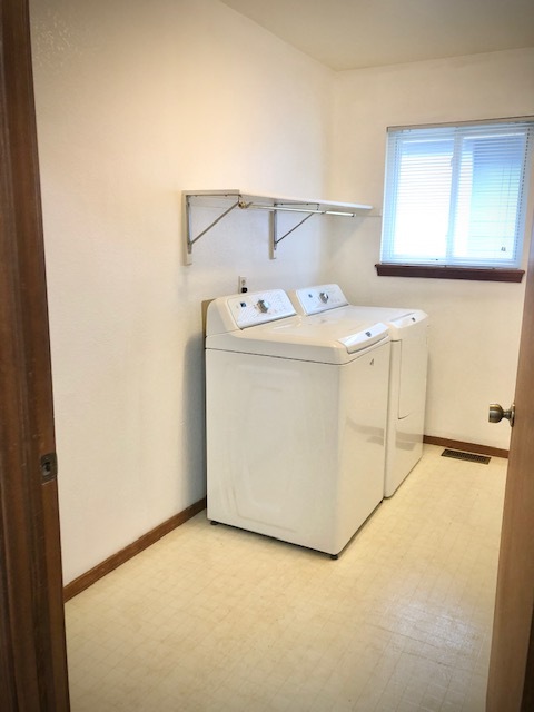 main level laundry room - 8659 Chancellor Dr