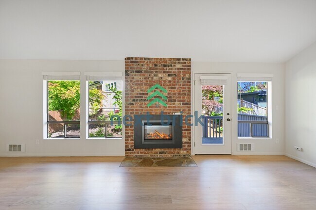 Foto del edificio - "Chic 2-Bed Townhouse Retreat in Bellevue – Spacious 1250 Sq Ft Living with Modern Comforts!"