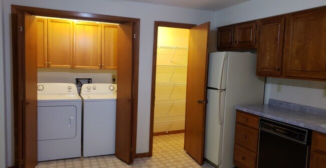 Just off kitchen, walk in pantry and washer/dryer - 330 Cayman St