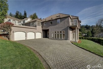 Building Photo - 8479 NE Woodland Cove Dr