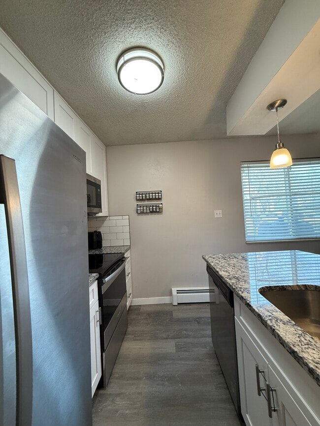 Foto del edificio - 7309 W Hampden Ave