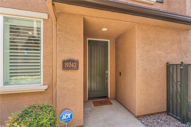 Town home feel like a single family home. With private back yard and patio. - 19342 Opal Ln