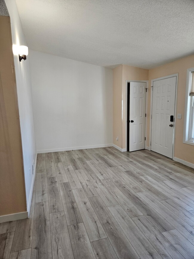 front door and living room - 8184 Washington St