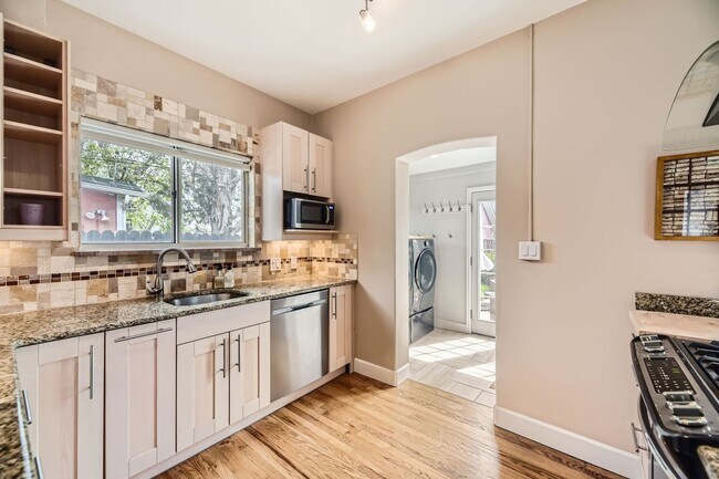 Building Photo - 2BD, 1BA Half-Duplex in Platt Park with Oversized 2-Car Garage