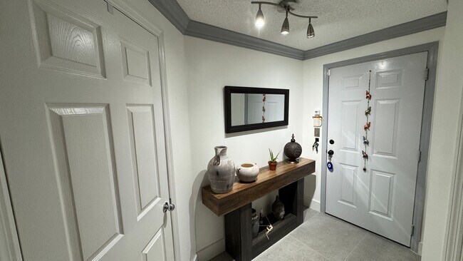 Building Photo - Unfurnished Annual Rental Available Now