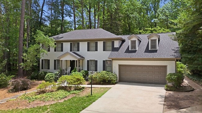 Building Photo - Stunning 5BR Inside-the-Beltline Retreat Near Crabtree & North Hills!