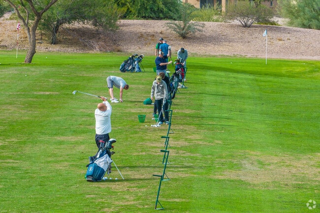 Golfers enjoying the range at Sundance Golf Club in Buckeye.
