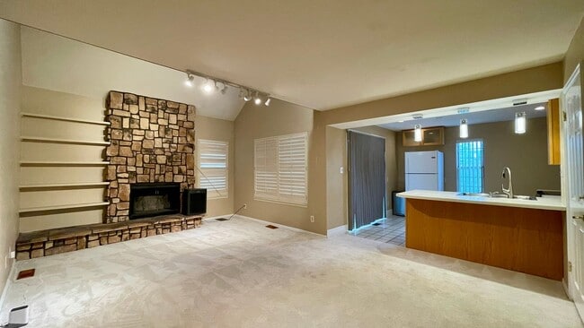 Building Photo - Mountain Views & Resort-Style Living Await!