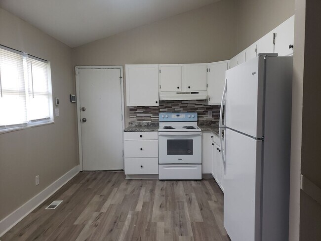 Building Photo - Updated Three-Bedroom Split Level Home!