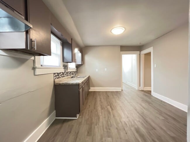 Building Photo - 5th Ave Abode: New Year, New Home: 50% Off...