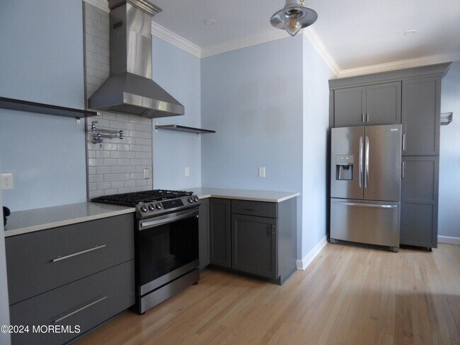 Building Photo - 61 8th Ave