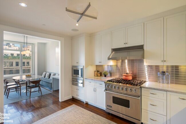 Building Photo - Furnished 4 Bedroom at The Laureate!