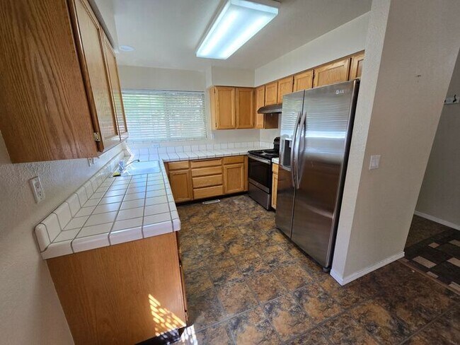 Foto del edificio - Inviting 3-bedroom Home in Established Sparks Neighborhood
