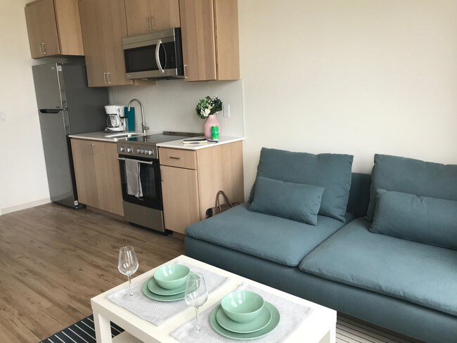 Building Photo - 3046 17th Avenue West, Unit 710