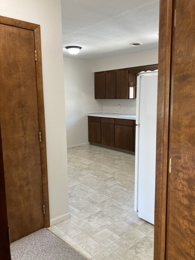 Entrance into Apartment looking right into Kitchen - 425 6th Ave NW