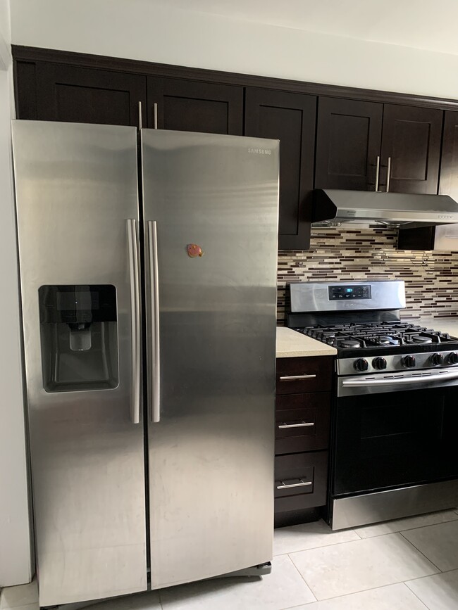 Kitchen with stainless steel appliances - 143 Juniper Rd