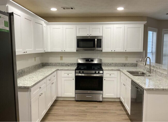 Foto del edificio - 810 Trellis Pond Ct