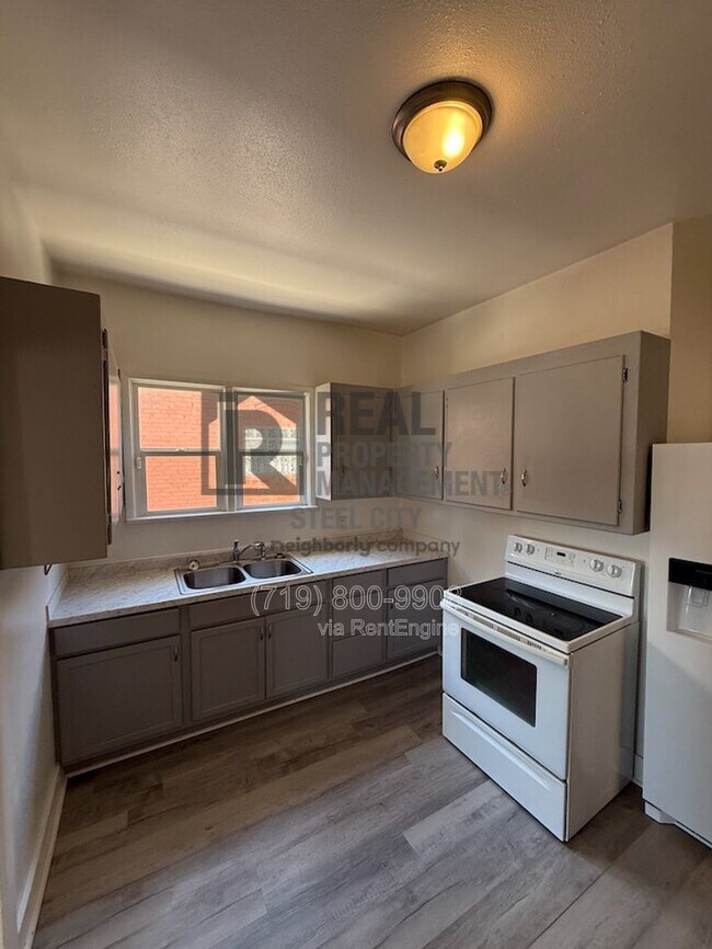 Foto del edificio - 1411 E Routt Ave