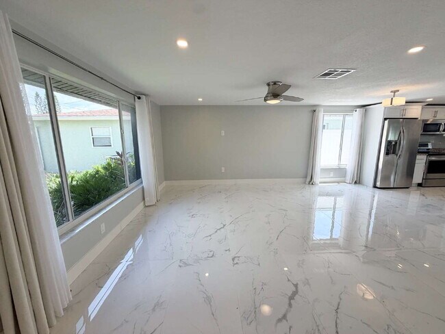 Foto del edificio - "Charming 2-Bed, 2-Bath Retreat in New Port Richey - Cozy Living at 4931A Pompano Drive!"