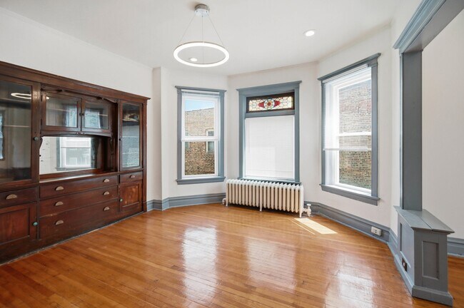 Foto del edificio - 1448 E 69th Pl