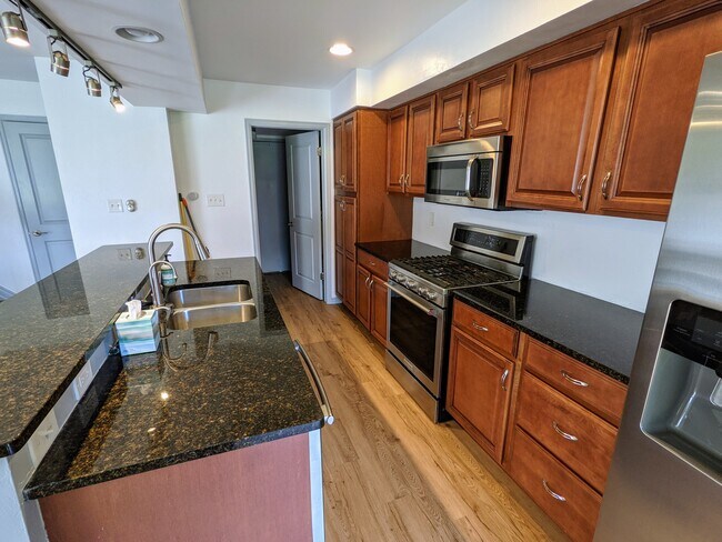 Kitchen looking to carport - 1120 Monroe Dr