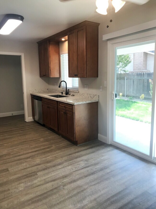 Building Photo - BEAUTIFUL REMODELED CORNER DUPLEX WITH GAR...